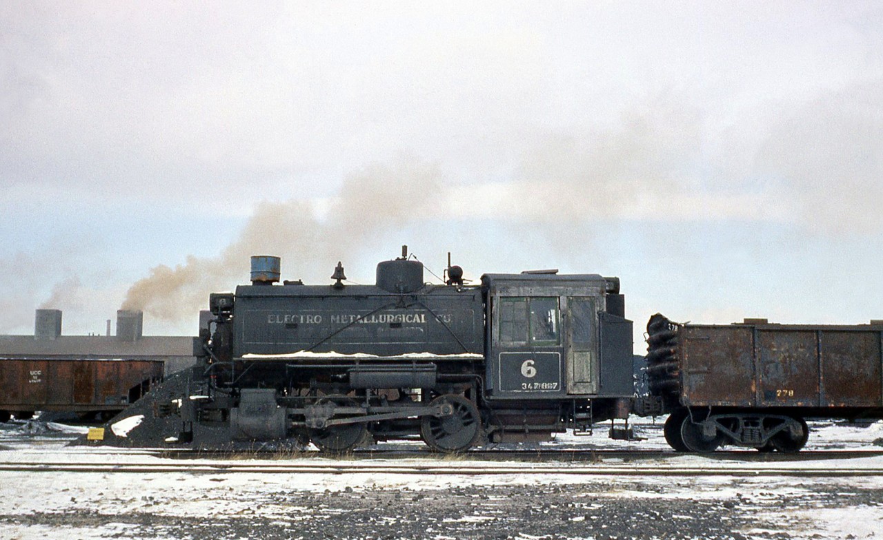 Electro-Metallurgical Company of Canada #6 (a small 0-4-0T steamer built by MLW in March of 1937), its stack capped, was still on the property of their Welland plant in 1961. The plant name would be changed to Union Carbide Company of Canada soon.

#6 escaped the scrappers torch through private ownership, and was at one time earmarked for display at the Ontario Science Centre. Today it sits on display at Charles Matthews Ltd's moving company lot in Markham ON (private property).