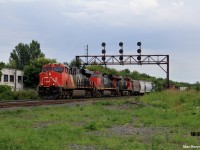 3 GEVO's bring Canadian National manifest M369 through CN Brighton making their way towards Toronto, with a pickup at Oshawa.