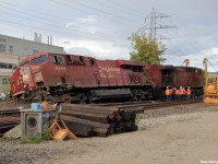 On Sunday, August 21st of 2016 Canadian Pacific train 235 collided with 118 at the Howland crossover in midtown Toronto just after 5am. CP 118 (taken away at time of the picture) was crossing over from the North to the South track at Howland crossover (the crossover pictured) while CP 235 was running light power (the 2 engines pictured) from CP's Toronto Agincourt yard to either Spence Yard on the MacTier Subdivsion or straight to Lambton Yard on the Galt Subdivision to pick up their train and proceed west. The rumor is that CP 235 was not paying attention to their signals and came around the corner barreling at Howland at upwards of 50mph, ran the red block and side swiped the last 18 cars of 118's train in the crossover. The results, a shaken up however okay crew.