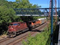 Canadian Pacific westbound autorack train 147 takes off from Toronto yard with CP 9769, an ex-Holiday unit that pulled the CP Holiday Train in the years of 2004, 2005 and 2006 and a BNSF leaser trailing as they head west.