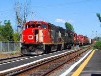 CN-4772 a GP 38-2w lead loco follow of NS 6983 SD-60E-Cn-7233 GY-418C Slug 220 +CN-7246 EMD GP-9  with 65 cars coming from SOUTHWARK yard  Cn-427 going to Taschereau yard 