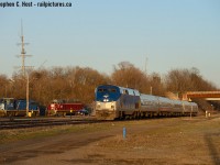 Arnold's photo of the CN bridge over the Linc reminded me of this shot - Stuart St is one of those special places for me - grew up watching trains here as a kid, and then as a young man working downtown - parked nearby just to watch the action before walking to Stelco tower. I wish I bought and owned a camera in those days. But you'd never consider shooting from 'the ground' in the last 15 years, as it has been all grown in for a very long time and most of our shots are from Bay St bridge. Suddenly in 2014 the site was cleared for  surveys and construction and a couple photos suddenly became possible. SOR's power tracks are clearly seen at left along with the Bayfront Park ship mast. Today this photo is well, a parking lot under construction, and will soon be all fenced in. Sometimes opportunity knocks for a short window of time and you should be ready to pounce. 