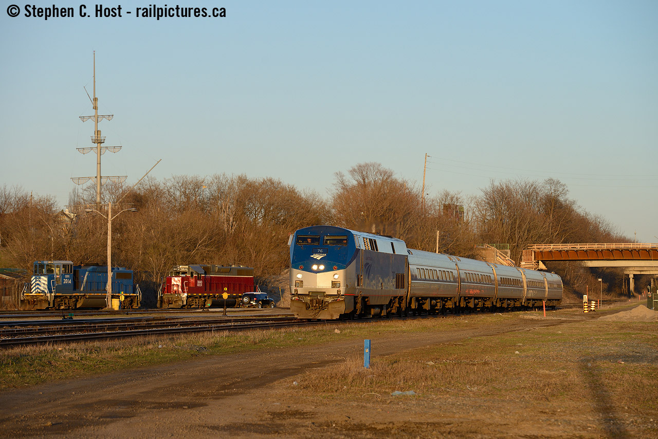 Stuart St is one of those special places for me - grew up watching trains here as a kid, and then as a young man working downtown - parked nearby just to watch the action before walking downtown. Wish I bought a camera with me in those days. But you'd never consider shooting from 'the ground' in the last 15 years, as it has been all grown in for a very long time and most of our shots are from Bay St bridge. Suddenly in 2014 the site was cleared for  surveys and construction and a couple photos suddenly became possible. SOR's power tracks are clearly seen at left along with the Bayfront Park ship mast. Today this photo is well, a parking lot under construction, and will soon be all fenced in. Sometimes opportunity knocks for a short window of time and you should be ready to pounce.