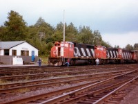 So many things that go on with the railroads that I need explanations for. Here is another. What looks like a convenient and well-maintained crew change point for the CN at South Parry (Sound) is no longer. I took it for granted as being relatively permanent (big mistake) and next time I stopped in, all traces of it were gone ! Instead I found a train stopped at a portable trailer on the east side of the line about a mile south by James Bay Jct Rd and a crew change taking place there. And another time at CN Boyne, just around the corner. This image  shows a better than average crew change stop. What happened? Parry area change eliminated??? Anyway, here is southbound CN 9502, 9479 and 5147 stopped in what I consider the better days.
