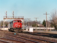 Another operation of the past in this area is the Triple Crown trailer train. Apparently it was no longer deemed an efficient operation. Here is the westbound Toronto to Detroit #145 as seen at Paris Jct behind CN 5411, an SD50F, NOT the 5411 seen these days, which is a newly acquired SD60. The locomotive featured in this image was retired within a couple of years and dealt off to the Dakota, Missouri Valley & Western, along with a handful of others of this series.