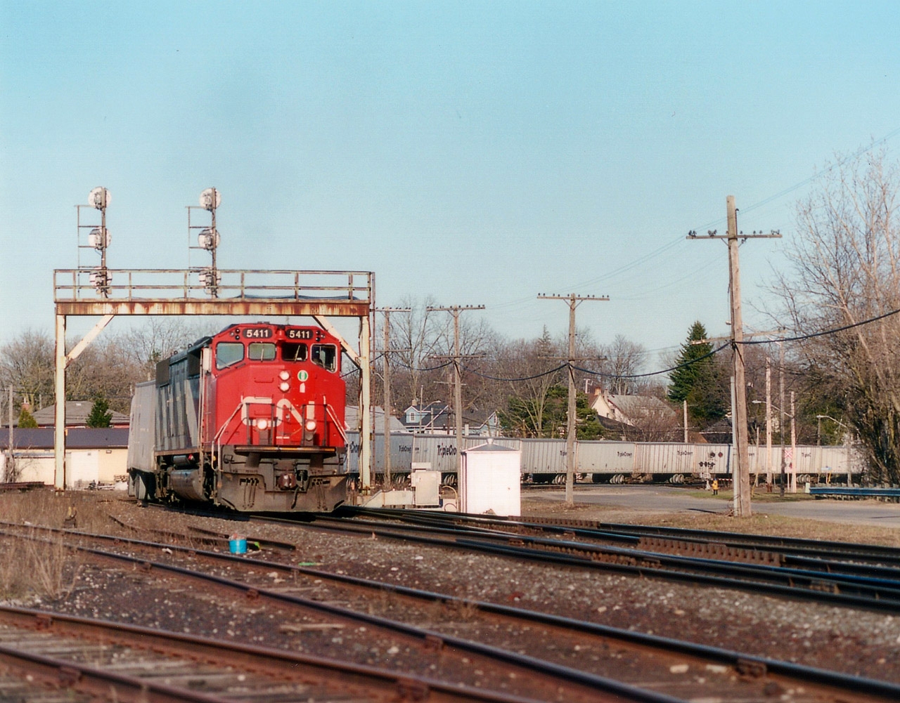 Another operation of the past in this area is the Triple Crown trailer train. Apparently it was no longer deemed an efficient operation. Here is the westbound Toronto to Detroit #145 as seen at Paris Jct behind CN 5411, an SD50F, NOT the 5411 seen these days, which is a newly acquired SD60. The locomotive featured in this image was retired within a couple of years and dealt off to the Dakota, Missouri Valley & Western, along with a handful of others of this series.