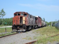 Crew of 537 parks it's train for a few minutes, so they can have Lunch, by Shur-Gain Grain Elevator. Everyone needs a lunch break, and gotta rest sometime. Perfect weather today for a nice break in the sun.