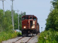 CN 4810 leads CN train 537 down the rough old Spur line in Northern part of Moncton.