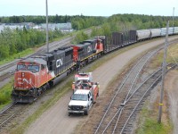 CN train 407 backs second half of it's train into CN Gordon Yard after coming in from Halifax, and MOW crew gets set to fix 1 of the Switches at the top end of the yard.