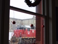 With Christmas a mere ten days away I was felling a bit festive. Kitchener's VIA station is usually decorated for the holiday's and this year would be no different. The decorations in the window seemed to blend well with the Railtex red paint on the GP38, certainly better then today's G&W orange. There are so many creative photo angles around that old station.