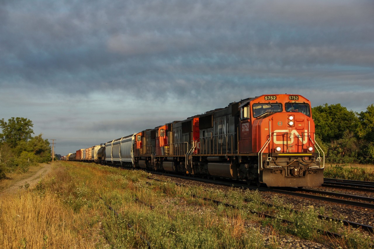 A very early 394 rolls through Paris with not one, not two, but three SD75i's, which is kinda nice to see. For those "stressing" about GEVOS taking over CN, go out a little longer, and you can find good lashups still. I've seen a good lashup everyday that I've been out, whether it's a C40-8, BCOL or IC. Almost every day there's something. Be patient and don't complain :)