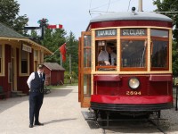 For those who don't know the area, in the early 1900s interurbans railroads were somewhat plentiful in Southern Ontario. The Halton Radial Railroad is built on a stretch of roadbed that once connected Eldorado Park ( west Brampton ) to Guelph. The line was abandoned in 1931 but the roadbed is still quite visible in numerous locations. Numerous pieces of rolling stock (many from the TTC) have been restored at the museum and some are operational. Here we see a couple of the volunteers readying the next run up the line beside the relocated CNR Rockwood station. 