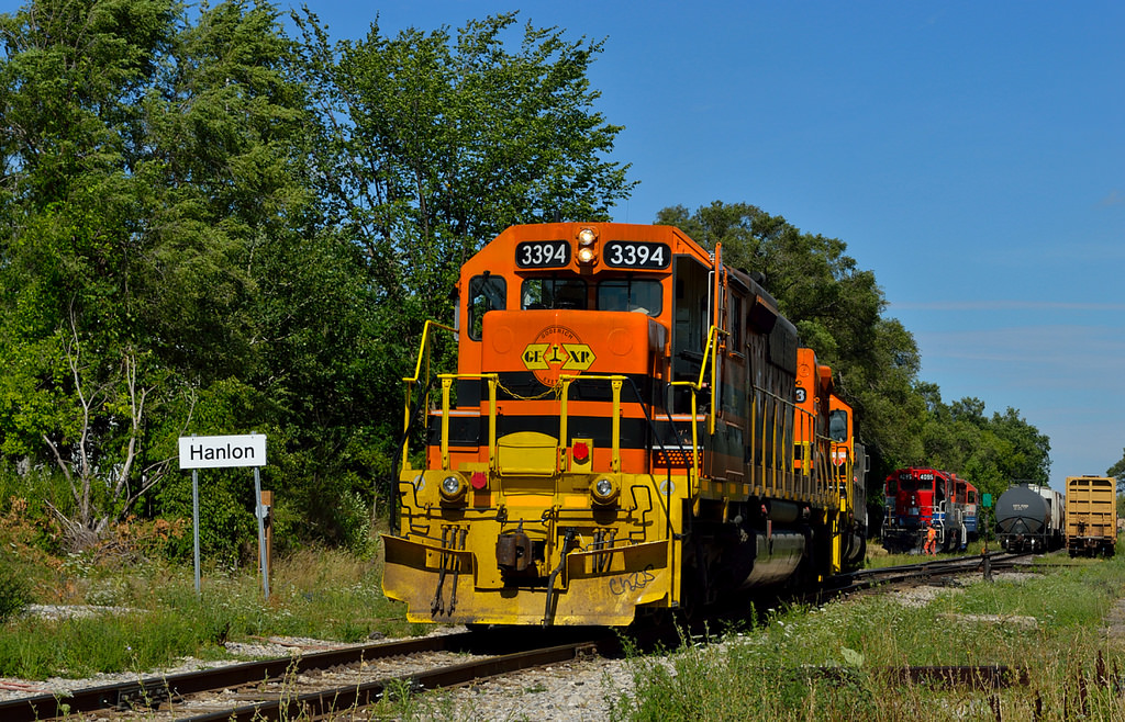 While I was waiting at control point Hanlon for GEXR 431, GEXR 580 coasted off the Guelph North spur and down XW12 to wait for The passage of 431. 580 would then typically follow 431 to Kitchener.  However, today 431 crawled up to Hanlon, and the power cut off from the train.  The SD-trio then backed into XW12 to retrieve 580's power, which was cut in for a ride to Kitchener.  I'm not certain if all units were online to haul the 68 car train west, but is sure sounded like they were.