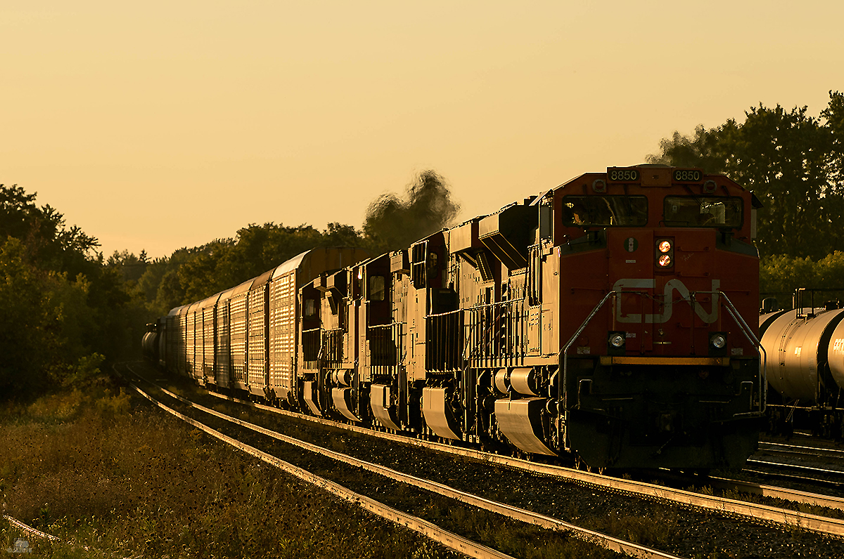 As the day comes to an end, M396 rolls across the iron road into brantford at sunset.