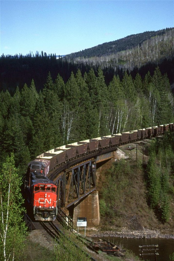 Most of the Clearwater Sub is difficult, at best, to photograph. This is one location that can be seen in the middle of nowhere (actually, a few kilometers east of Vavenby. For the most part the stretch of highway from Kamloops to the Yellowhead Pass is for doing miles as quickly as you dare.
At this spot, the view opens as the tracks cross the North Thompson River, making for a fine view of a westbound Sulphur train.