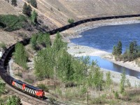 5451 and sister 5450, lead an empty coal train back to the coalfields around Hinton AB.