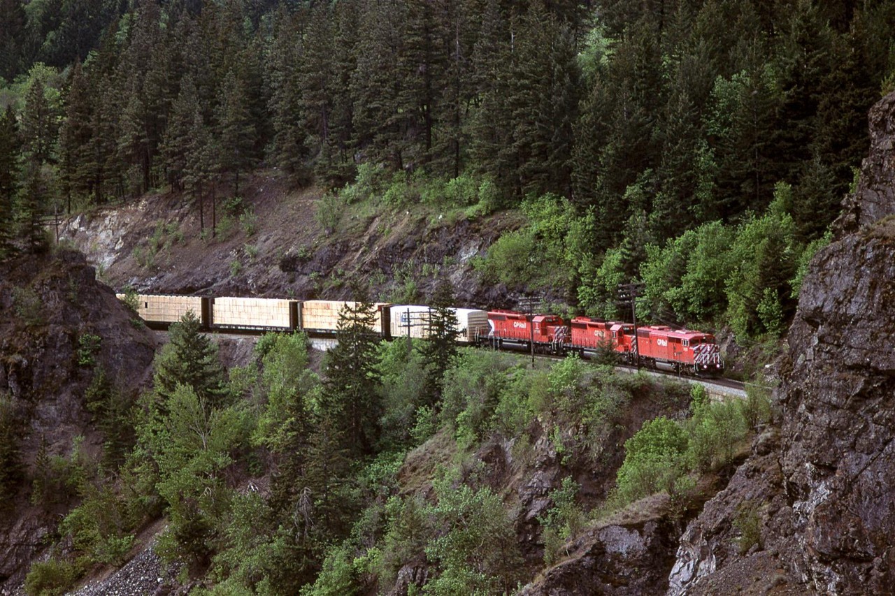 This eastbound train is about to cross over the Fraser River at Cisco. Although the classic shot is of the train on the bridge, I prefer this view with the train as it is about to enter the tunnel just before the bridge.