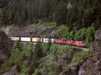 This eastbound train is about to cross over the Fraser River at Cisco. Although the classic shot is of the train on the bridge, I prefer this view with the train as it is about to enter the tunnel just before the bridge.