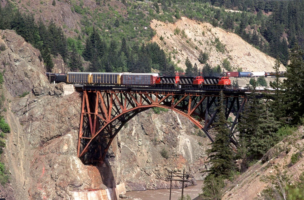 The classic view of a westbound train at Cisco. It is rather amazing that this was the best location to cross over the Fraser River.