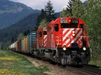 Not a particularly creative photo, but it does show a typical high priority train in CP in the early '90's - Box cars, and TOFC. Note the "extra" lights and the pole line, also.