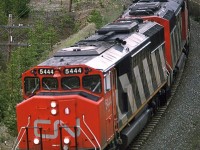 Another one of the few places where the road offers a view of the RR in the desolation of western BC, is just west of Valemount, where the road passes over the tracks.
An eastbound coal empty approaches Valemount.
