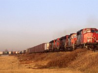 Yet another shot at Bailey in NE Edmonton. But this time, we have low angle winter light.
I never did hear the train symbol, but it looks like a regional train with a GP-9 to be delivered to a small yard and a lone container for a small intermodal facility.