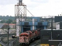 The "red barns" arrived after I left Calgary, therefore, I do not have all that many shots of them. However, on a visit to the city, I would often take a few moments to check out Alyth yard/shops from the Blackfoot Trail bridge.
This power set has completed its maintenance and is being moved to a ready track.
