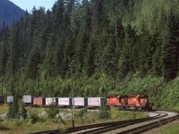 A eastbound COFC train works upgrade on Rogers Pass west slope.