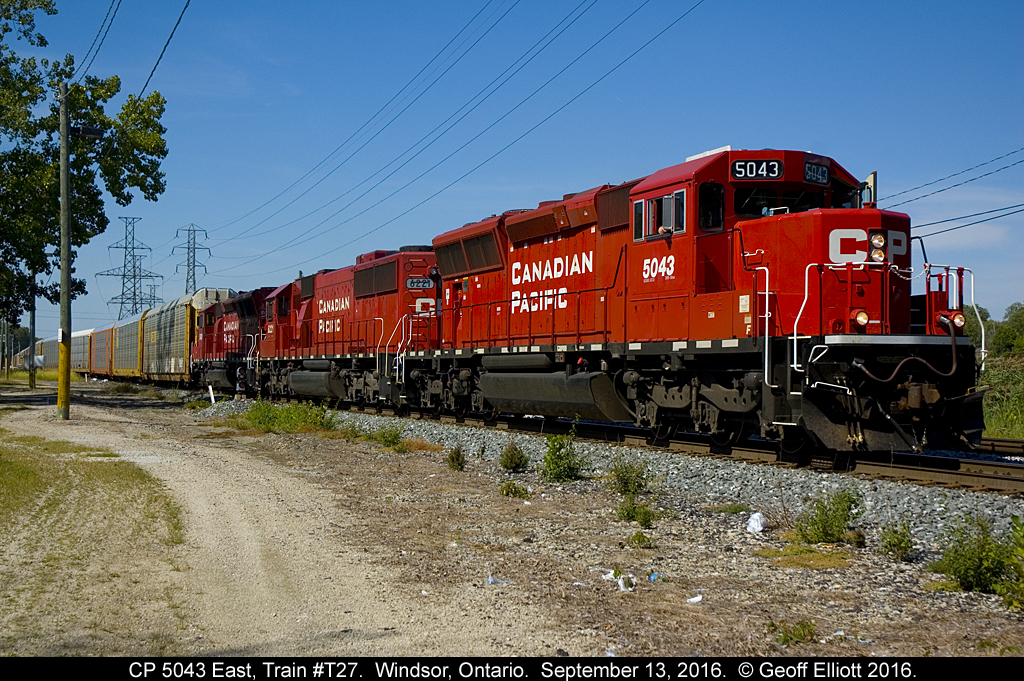 CP transfer T27 returns to Windsor from the U.S. with a big cut of cars as 5043 rolls past Dougal Ave.  The train will head out to Lakeshore and then back into Windsor Yard where the cars will be switched out for various eastbound trains to lift.