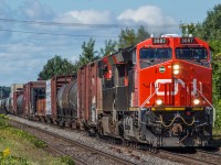 CN 368 comes through Dorval with CN 3087 leading the way.

CN 3087 marks the 1000th locomotive built at GE's Fort Worth plant in Texas.

CN 3087 & CN 3011