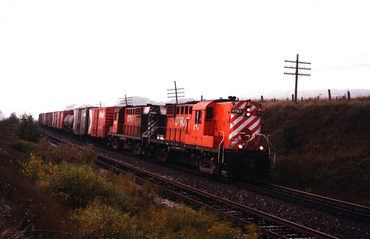 A pair of RS-18's haul freight east. Photo by my brother.