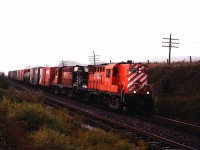 A pair of RS-18's haul freight east. Photo by my brother. 