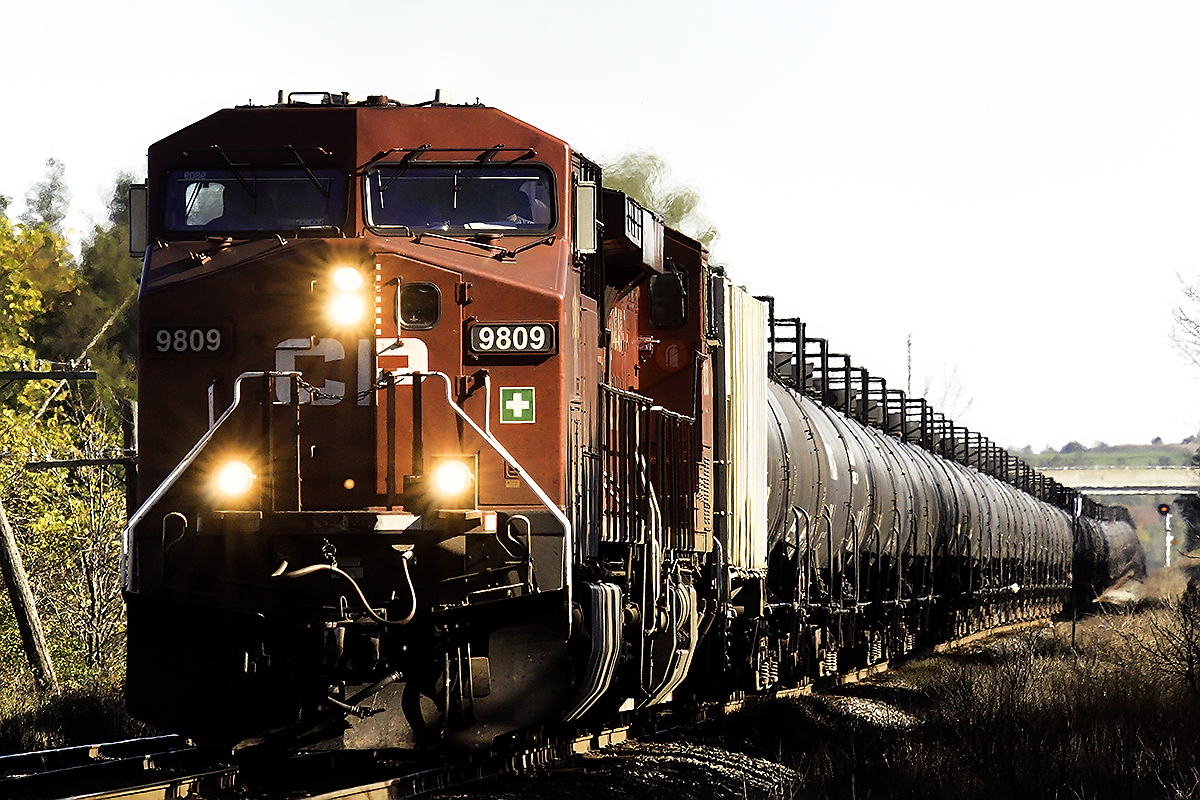 Empty ethanol train coming under highway 6.........long before the signal change was thought of