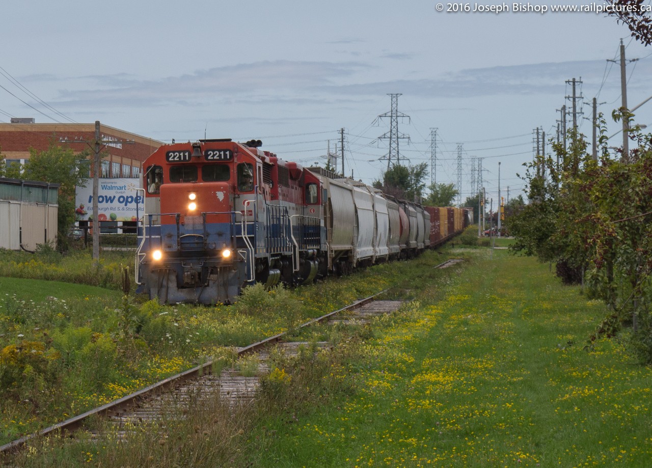 GEXR 580 trundles along a fairly rough stretch of trackage in Guelph on their way back to Kitchener.