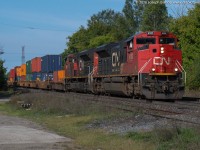 CN Q148 is lead downgrade through Copetown by CN 8102, one of four ex EMD Demonstrator SD70Ace's on the CN roster.  