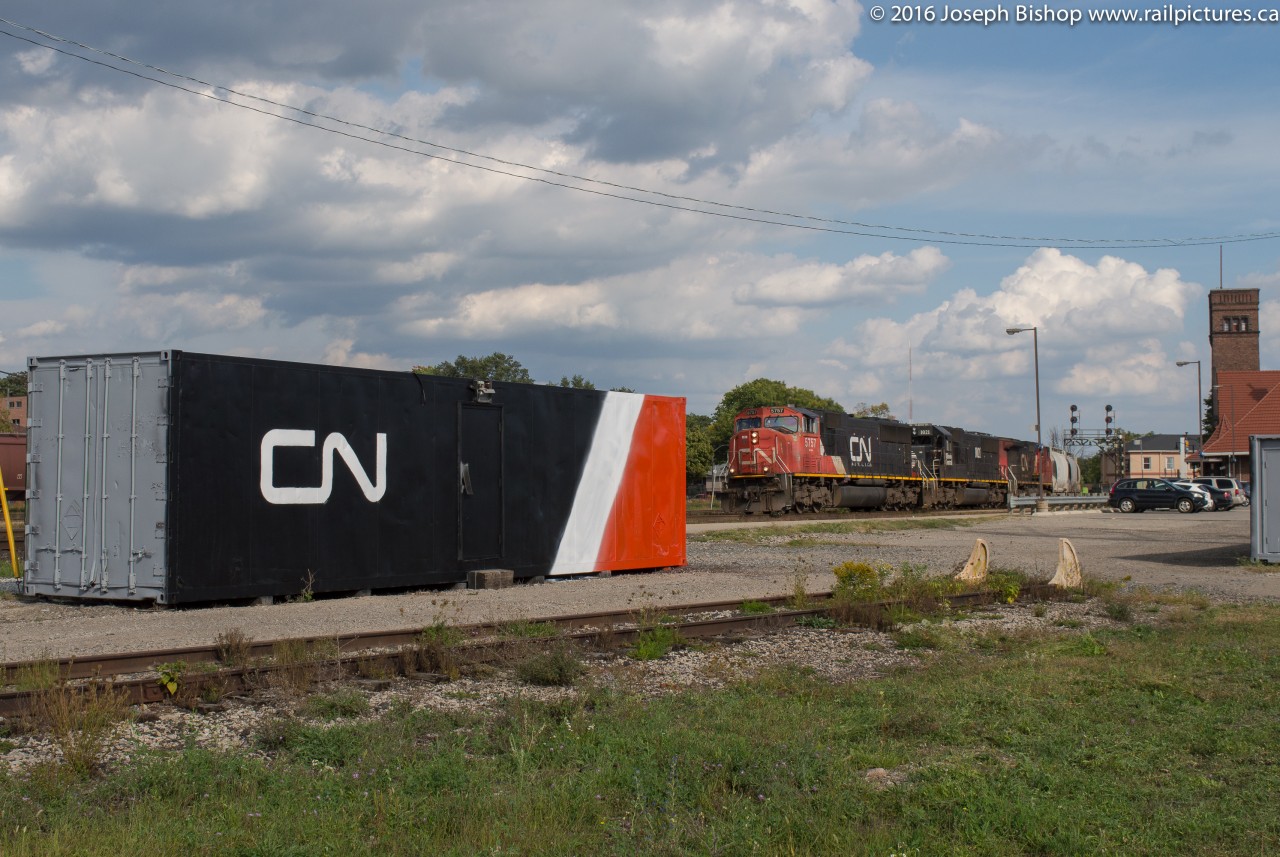 CN 435 arrives at Brantford with CN 5757 IC 1021 CN 2099.  They are passing the freshly painted CN container located alongside the Brantford Yard.  The container was painted by CN maintainer Brad Jones and it really cleans up and adds some class and pride to the location.  Well done!