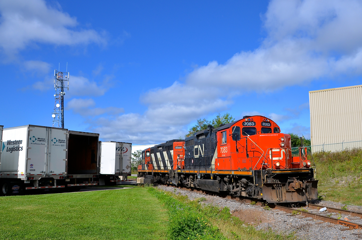 An obscure industrial spur. CN 564 with a pair of GP9's (CN 7083 & CN 4139) is heading light towards the end of an obscure industrial spur in Montreal (the St-François Spur, which branches off the Doney Spur) to pick up some plastic pellet cars.