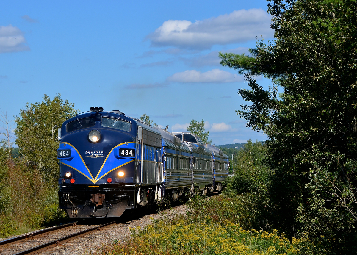 Almost done its run. Led by FL9 OEXX 484, the Orford Express is almost done its run as it approaches the town of Magog where it will tie up until the evening run.