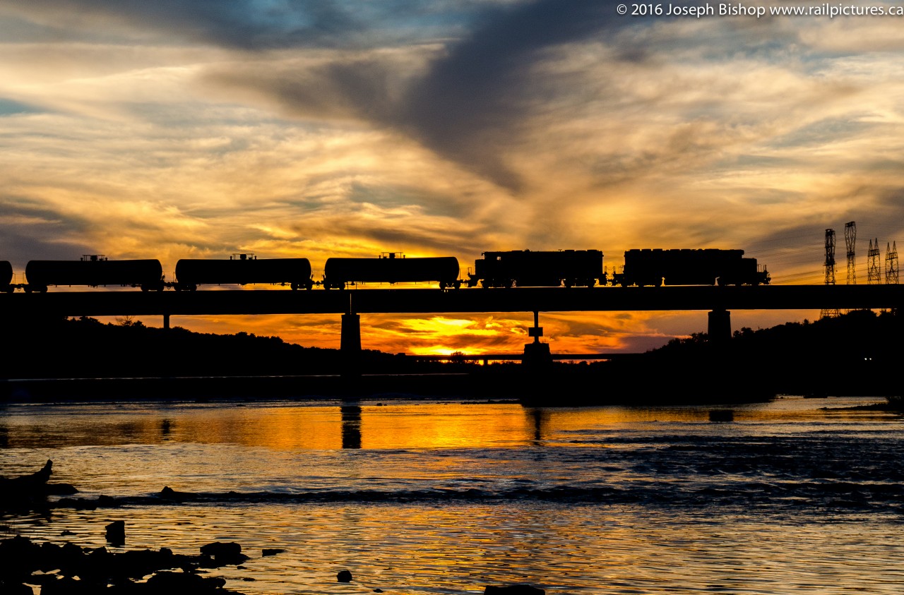 The last light of a hot and humid July day creates a beautiful silhouette of RLHH 597 as they make their way across the Grand River in Caledonia.