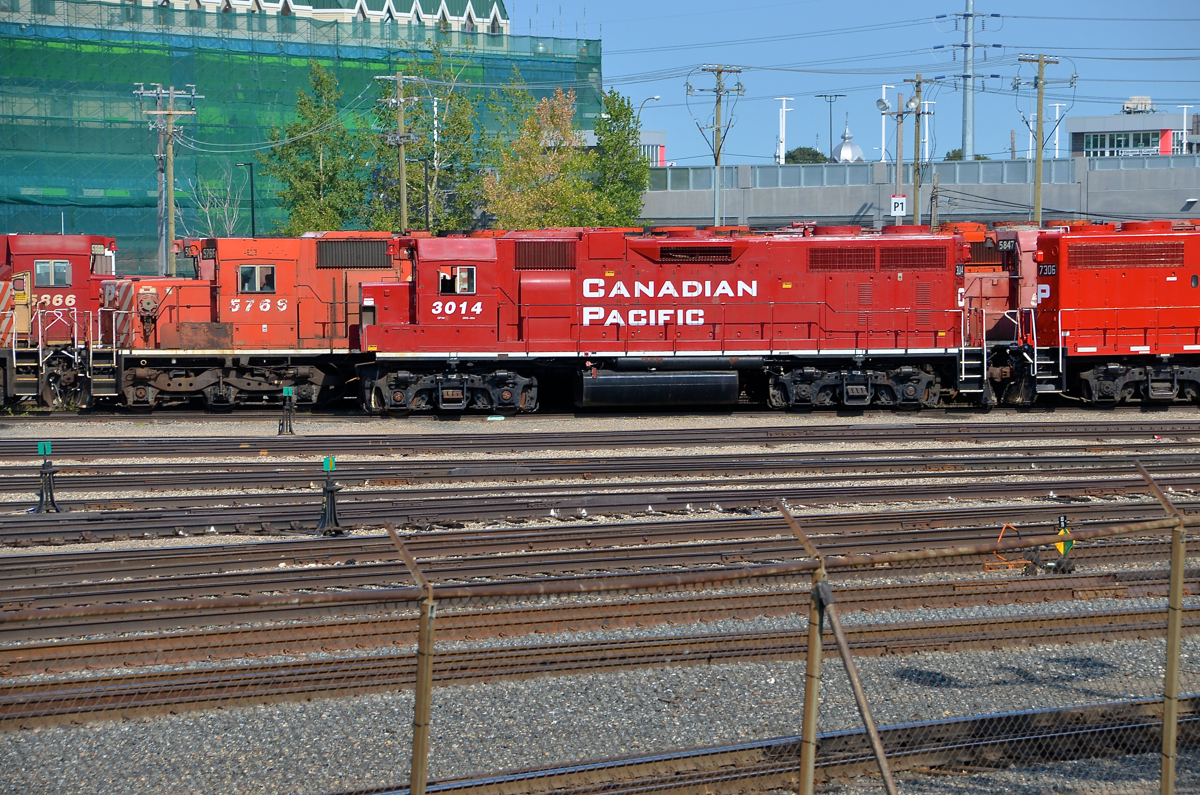 Something seems to be missing. GP38AC CP 3014 seems to be missing part of its nose as it sits in the deadline in Weston Yard. Interestingly enough an online roster says this unit was retired after collision damage in June 2013 but reactivated after rebuild in May 2015.