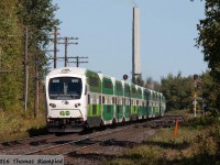 The class leader of GO's new cab cars leads 721 towards a station stop at Guildwood.