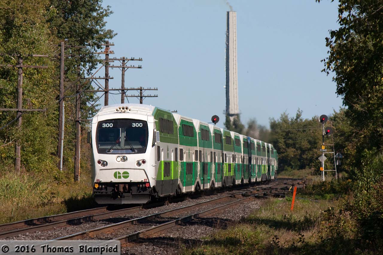 The class leader of GO's new cab cars leads 721 towards a station stop at Guildwood.