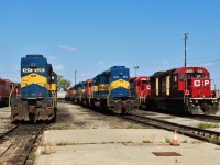<b> ICE ICE Baby </b> Two Iowa Chicago & Eastern units that have been sold, 6211 to Recycling and 6213 to Larry's Truck Electric sit at the east end of the shop tracks.