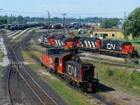 Back in 1997 CN's yard in Niagara Falls was still a fairly busy place, with a number of locals serving the Niagara region assigned there. Power at the time was typically GP9RM's and SW1200's, and vans were still common on most local jobs. Today Trillium RR has taken over most of CN's local assignments in the region. The yard here has been abandoned like the one at a Fort Erie. Port Robinson is now CN's main yard in the region and only a couple of four axle units are kept ther for any remaining customers directly served by CN.  