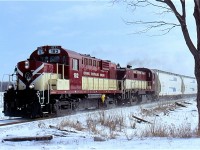 In early 2006 OSR 182 was the freshest looking unit on the companies roster. OSR's Guelph Jct. RR at that time was all 251 prime mover equipped MLW built units, mainly RS18s and RS23s. The182 last worked for the Quebec Gatineau RR. The days train is seen storming northward out of Moffat towards Guelph for a day of switching the industries in town.