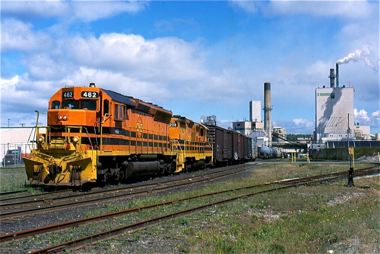 Huron Central's Espanola turn is seen working the large paper mill at Espanola. This is the last industry using rail service on the Little Current subdivision, one time Algoma Eastern. While the majority of this line was still intact back in 2001 today almost all of it is gone. The SD45s and GP9s are also gone today as well, replaced by GP40s and other four axle units.