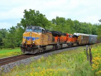 The power for yesterdays CP 650 ended up on todays CP 147. UP 5554 with BNSF 3909 and BNSF 6675 lead an unusually early and short 66 axel, 1316 foot auto rack consist up to the Victoria Road crossing in Puslinch. 