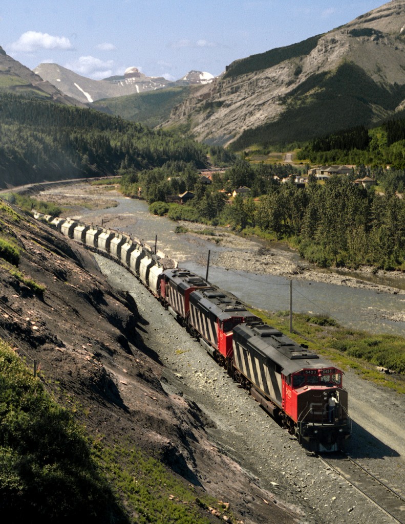 Limestone empties from Edmonton back from Leyland Junction to the quarrie just beyond the village of Cadomin. The power will return to Leyland while train is loaded.