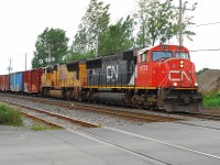 CN- 5773 GF-643-c with Union Pacific 5230 SD-70-M2  coming from Taschereau Yard  route 394