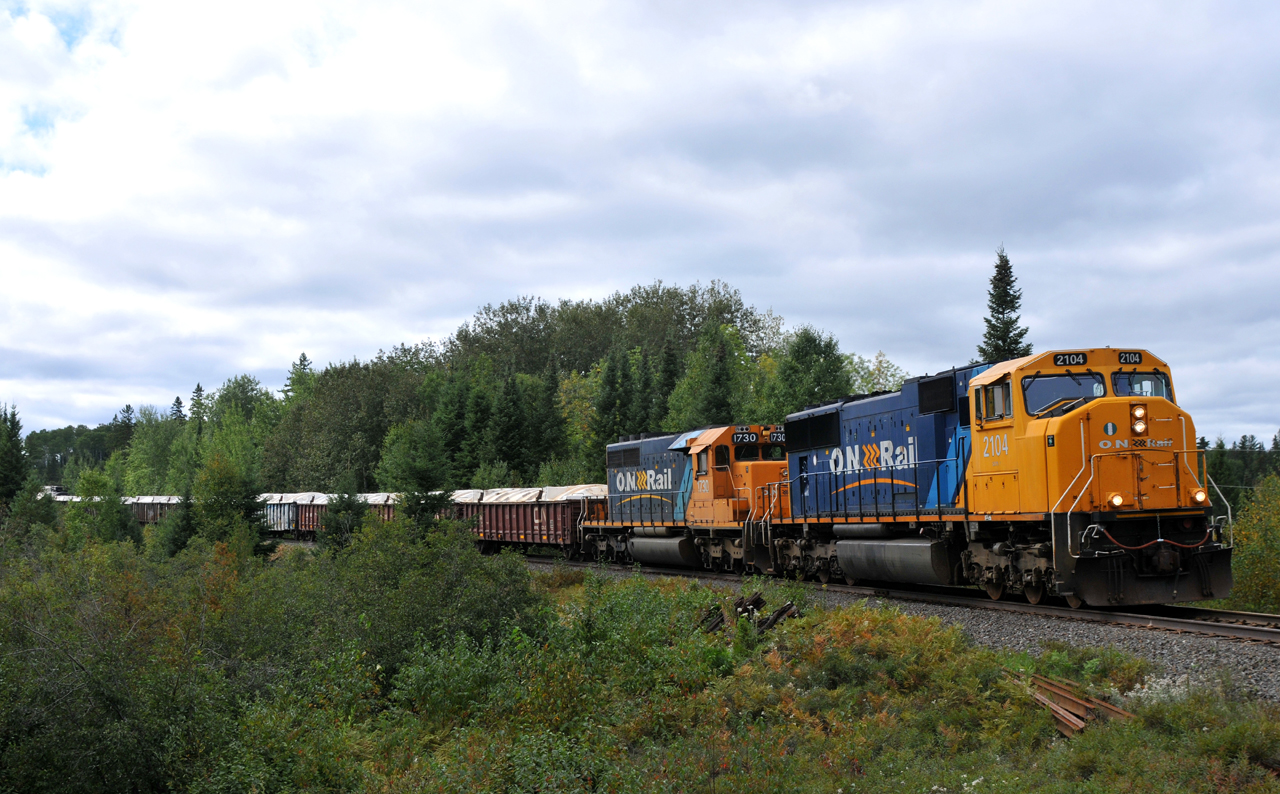 211 rounding the "S" bend at Diamond Lake with ONT 2104 - ONT 1730 in charge of 48 cars